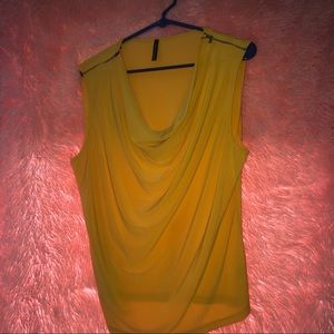 Yellow shirt with zippers on shoulders